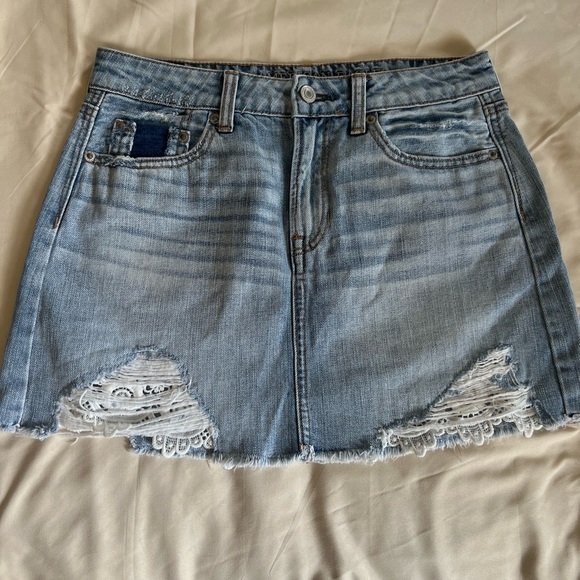 American Eagle Outfitters Dresses & Skirts - American Eagle Denim Distressed Mini Skirt with Lace Detail Size 0